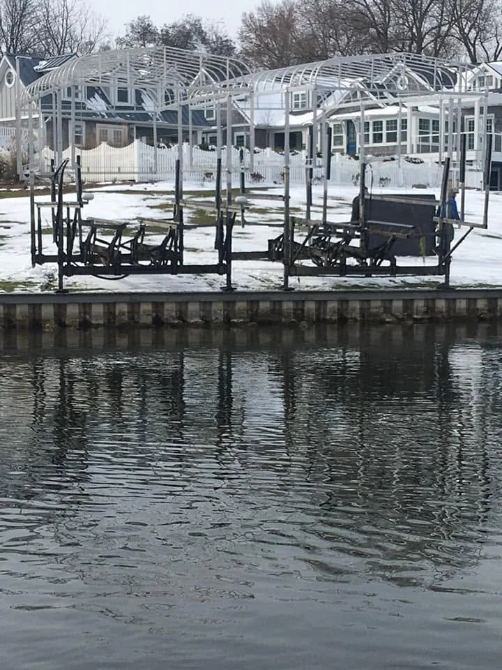 Boat lifts pulled out and stored on shore for winter